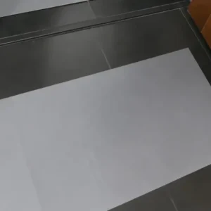 Sticky Mat Gris – Alfombra adhesiva multicapa para control de polvo y partículas